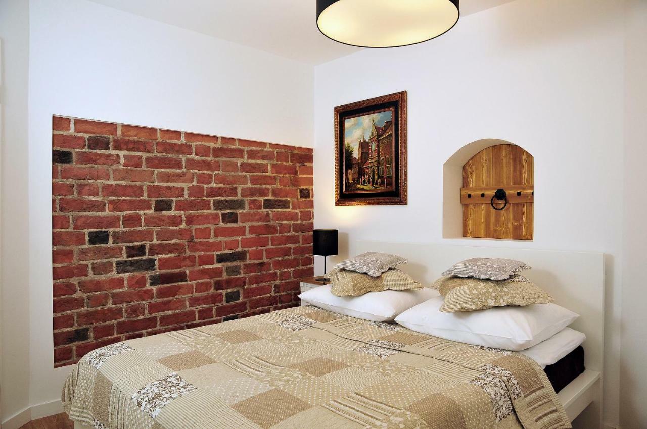Apartamenty Kopernika 14 ทอรูน ภายนอก รูปภาพ