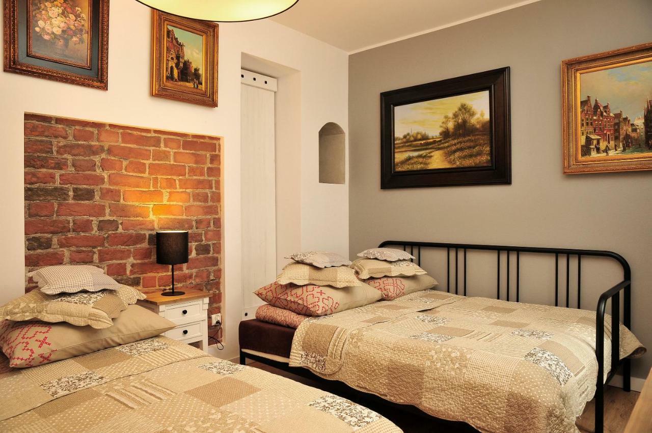 Apartamenty Kopernika 14 ทอรูน ภายนอก รูปภาพ